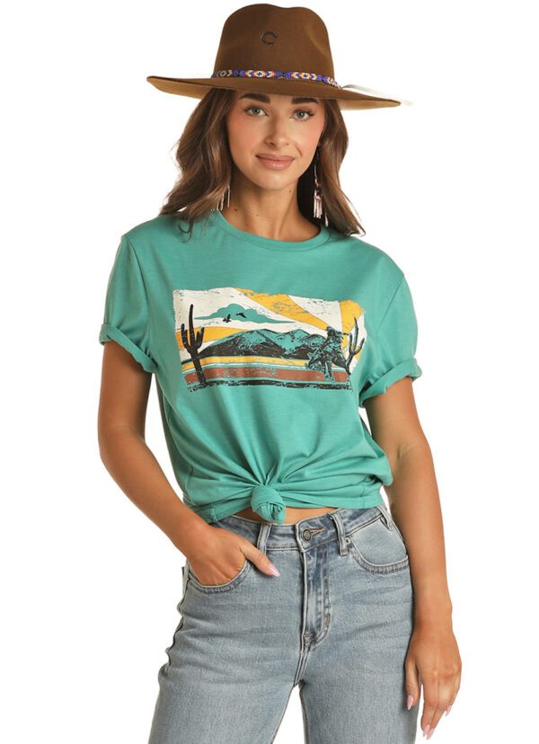 A Teal Color Shirt With a Desert Scene Print