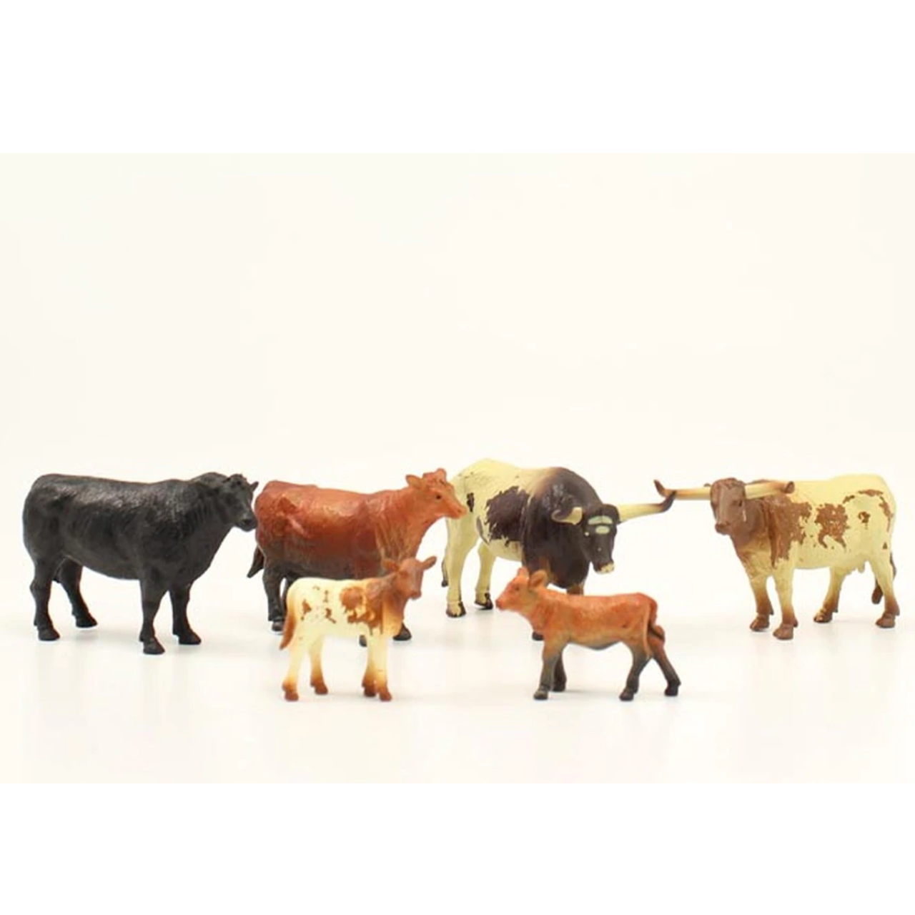 Farm Animals Toy Set on a White Background