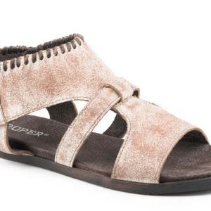 A pair of sandals that are tan and black.