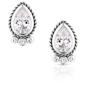 A pair of silver earrings with white stones.