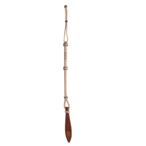 A wooden paddle hanging from the side of a rope.