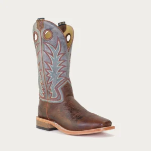 A cowboy boot with blue and brown leather.