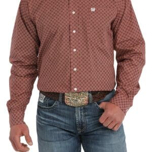 A man wearing jeans and a red shirt.